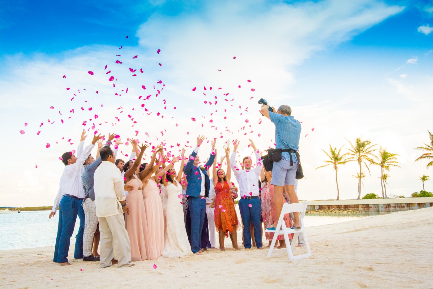 Paradise Photography photographer capturing a beach celebration