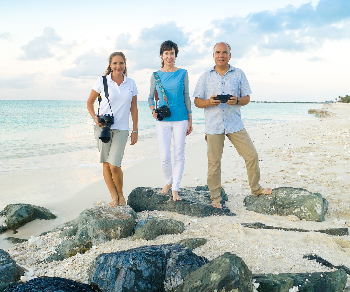 The Paradise Photography team on the rocks at Grace Bay