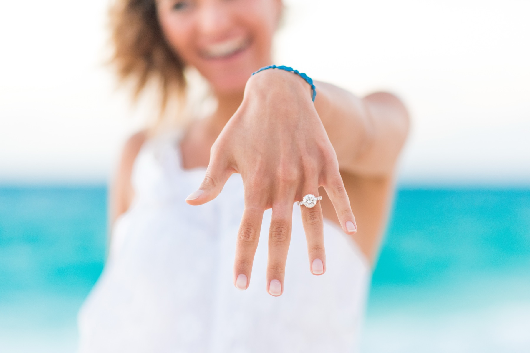 Close-up of a hand showing off a new engagement ring in Turks and Caicos